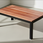 Tyto Square solid Cherry coffee table, finished — 46.5" × 26.5" top, 18" tall, shown in a lifestyle setting — Finished
