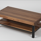 Tyto Puro solid Walnut coffee table with lower shelf, finished — 46.5" × 26.5" top, 18" tall, studio photo on a neutral background